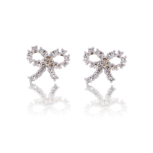 Brinco infantil ouro branco laço diamantes 0,39 ct 